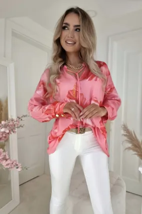 Blusa ampia in viscosa rosa a fantasia floreale con scollo a V allacciabile